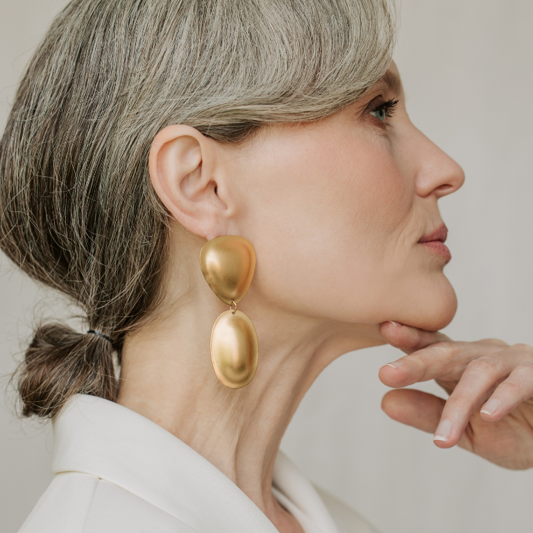 assurance gold earrings